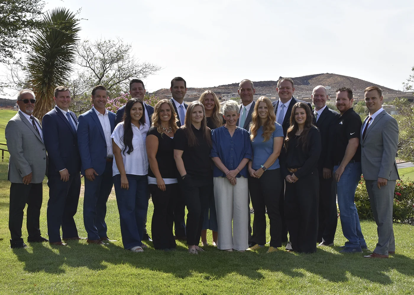 The JMI Group team together at a company property